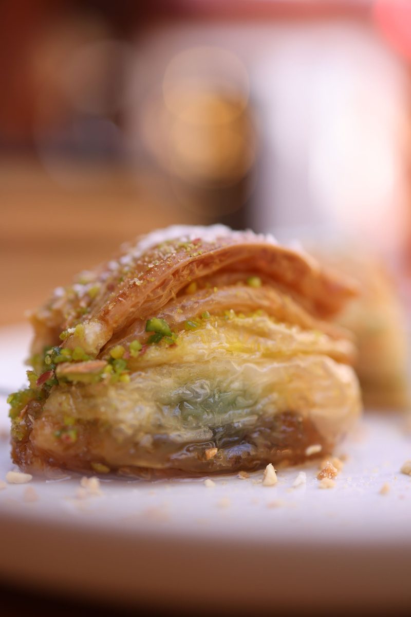 Finished pistachio baklava with golden flaky layers and chopped pistachios