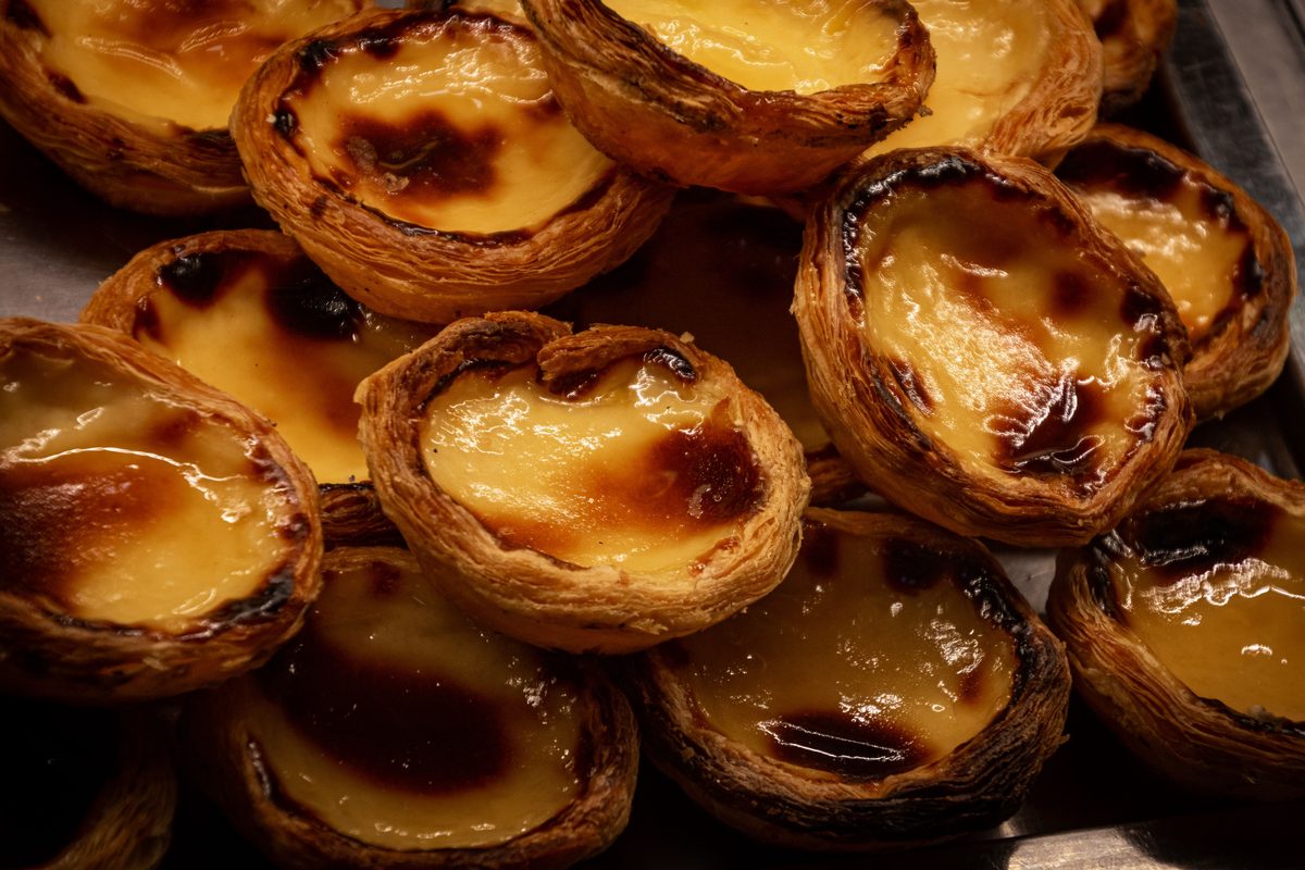 Finished flan pâtissier, a golden French custard tart with a caramelized top and flaky pastry crust