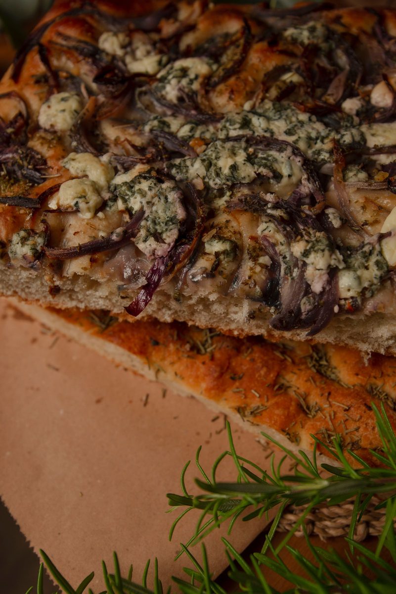Finished focaccia topped with onion marmalade, blue cheese, and walnuts