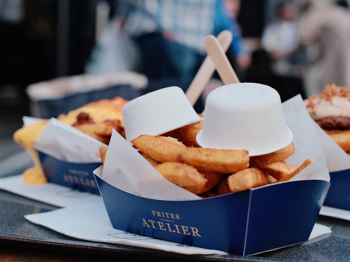 Finished Belgian French fries served hot and golden