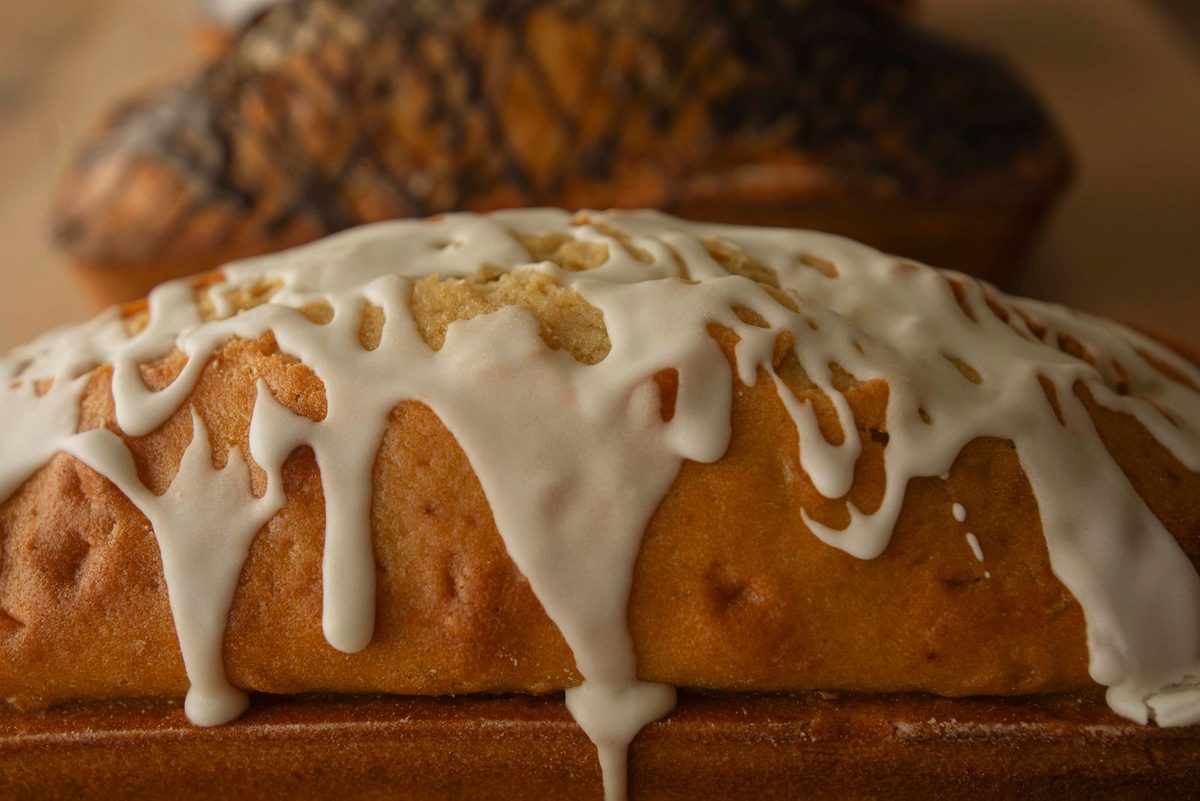 Finished Gâteau Nantais (Nantes Cake), a golden almond cake with white glaze