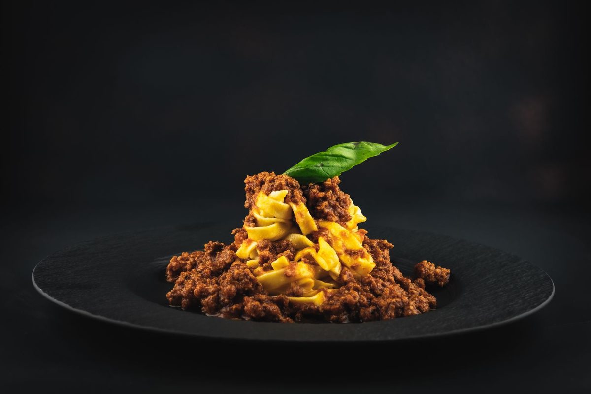 A finished plate of spaghetti with Bolognese meat sauce